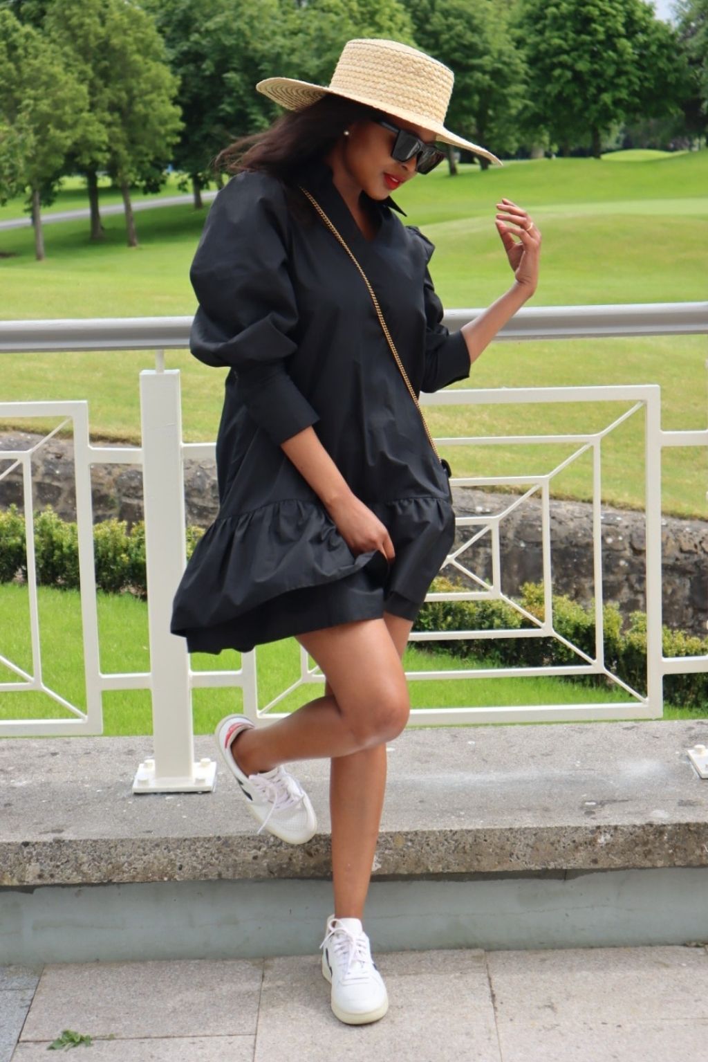 Our Black Poplin Dress is designed with you in mind. We have kept all the important design features from the original dress, but have added a hem drop to make it more flattering for those looking for a contemporary look.